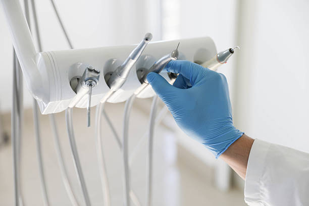 Professional Emergency Dentist technician working in Johns Creek, GA